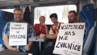 IP Amazon delegation on the way to a protest in Warsaw, 2016 - banner: "No to dismissals at Amazon" and "You will not fire us all"